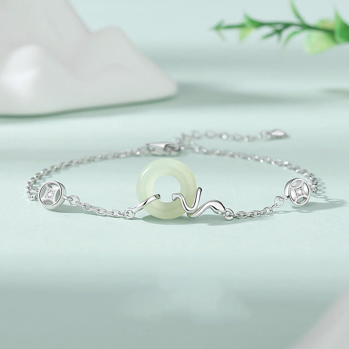 Pulsera de la suerte del año de la serpiente con hebilla de paz de jade hetiano y Buddha Stones en plata de ley 925