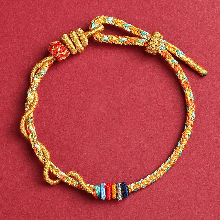 Pulsera trenzada de protección del año de la serpiente con hilo rojo y Buddha Stones