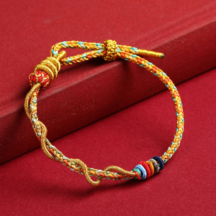 Pulsera trenzada de protección del año de la serpiente con hilo rojo y Buddha Stones