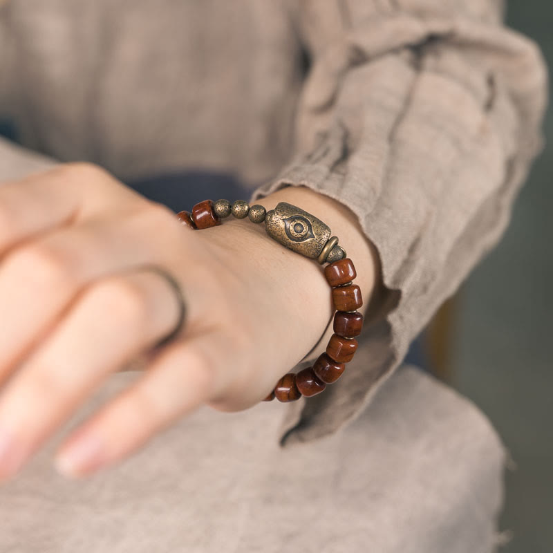 Pulsera de fuerza con colgante de cono de cobre en forma de Dzi y hueso de yak con Buddha Stones