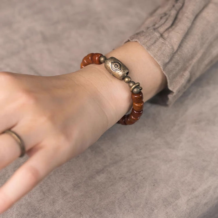Pulsera de fuerza con colgante de cono de cobre en forma de Dzi y hueso de yak con Buddha Stones