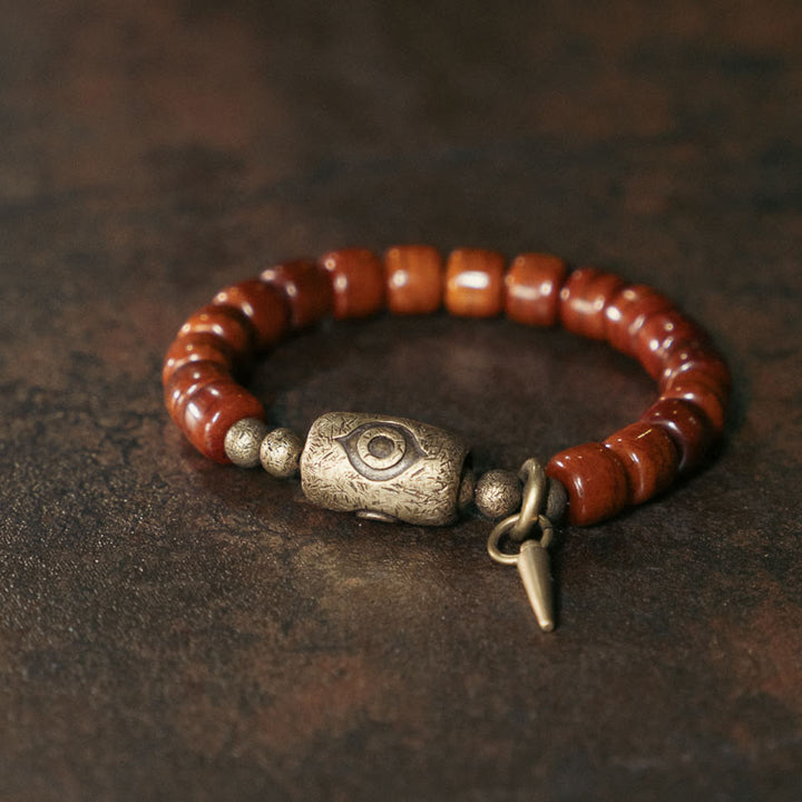 Pulsera de fuerza con colgante de cono de cobre en forma de Dzi y hueso de yak con Buddha Stones