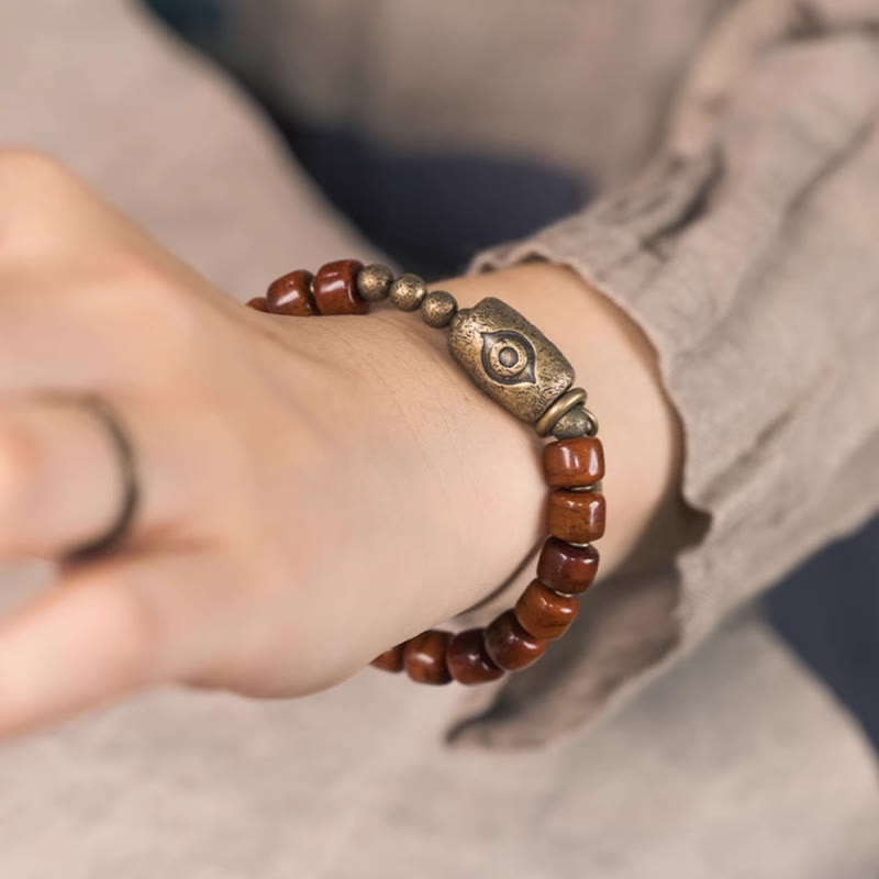 Pulsera de fuerza con colgante de cono de cobre en forma de Dzi y hueso de yak con Buddha Stones
