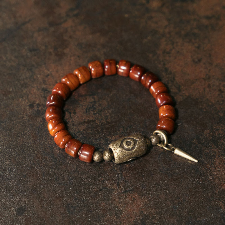 Pulsera de fuerza con colgante de cono de cobre en forma de Dzi y hueso de yak con Buddha Stones