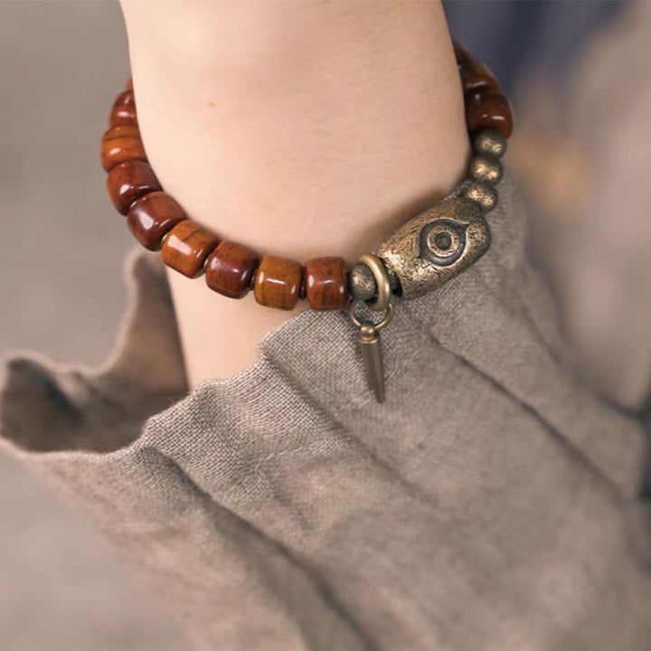 Pulsera de fuerza con colgante de cono de cobre en forma de Dzi y hueso de yak con Buddha Stones