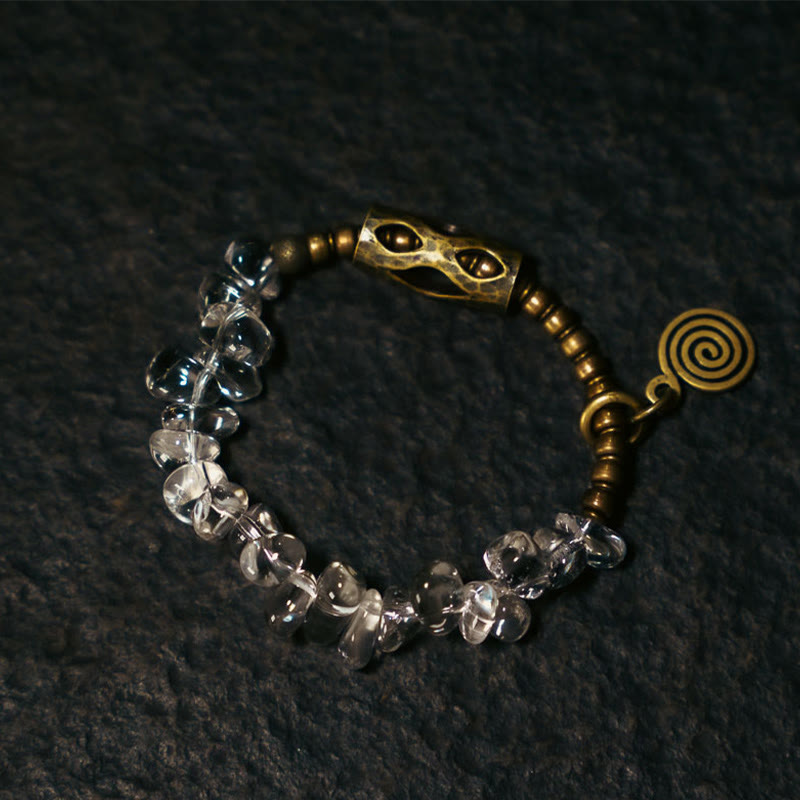 Pulsera de cobre con cristales blancos irregulares y Buddha Stones