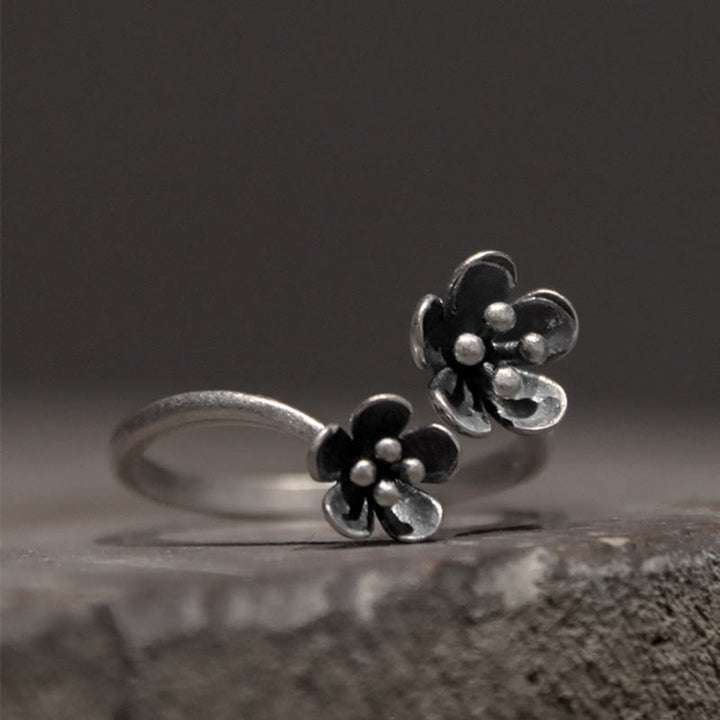 Anillo de flores de plata de ley 925 con Buddha Stones