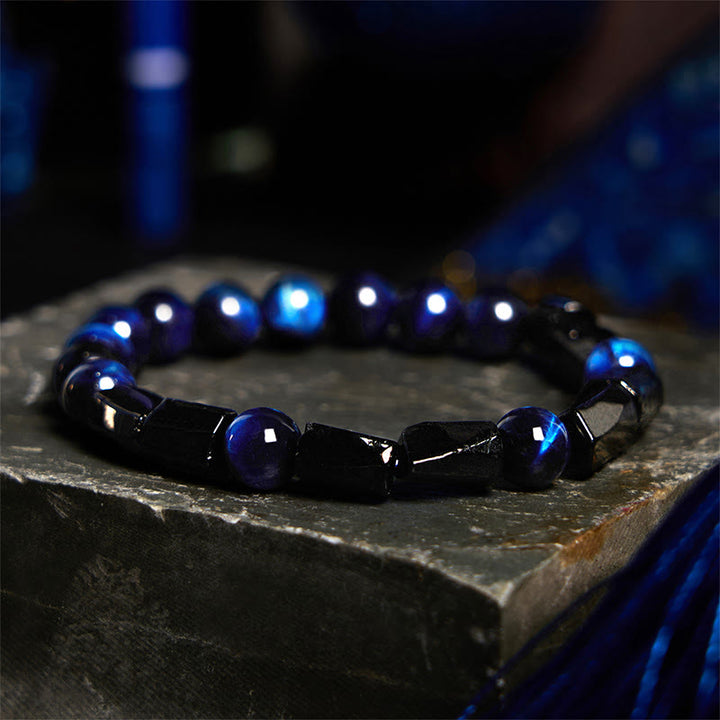 Pulsera de fuerza con turmalina negra y ojo de tigre azul de Buddha Stones
