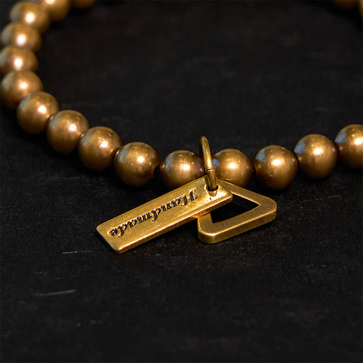 Pulsera de equilibrio con cuentas de cobre y Buddha Stones