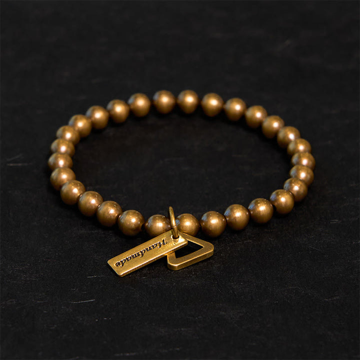 Pulsera de equilibrio con cuentas de cobre y Buddha Stones