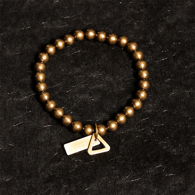 Pulsera de equilibrio con cuentas de cobre y Buddha Stones