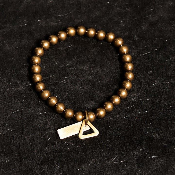 Pulsera de equilibrio con cuentas de cobre y Buddha Stones