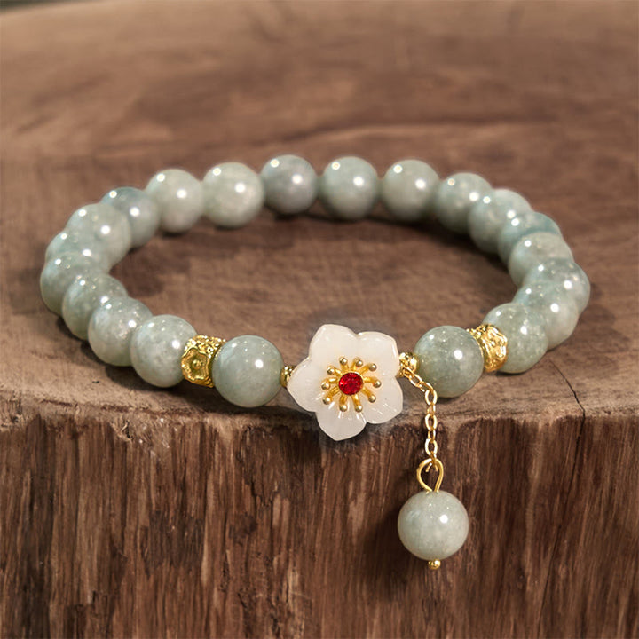 Pulsera de jade con flor de abundancia y Buddha Stones