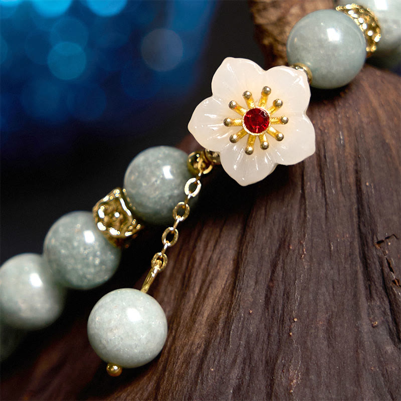 Pulsera de jade con flor de abundancia y Buddha Stones