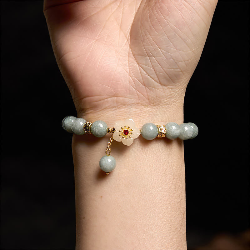 Pulsera de jade con flor de abundancia y Buddha Stones