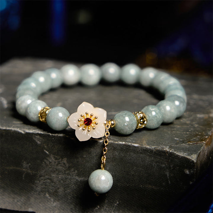 Pulsera de jade con flor de abundancia y Buddha Stones