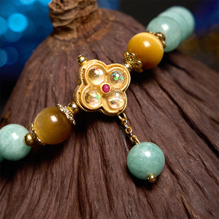 Pulsera de prosperidad con jade y ojo de tigre amarillo y Buddha Stones