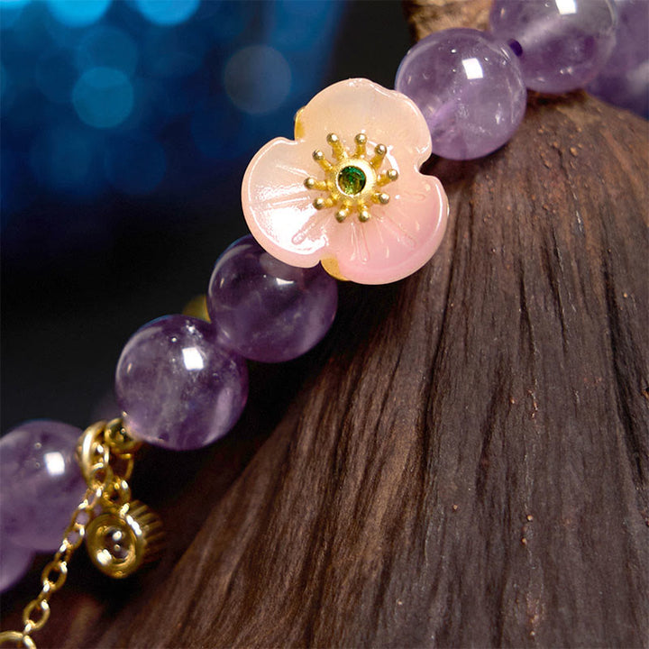 Pulsera de meditación de la fortuna con amatista y flor de durazno y piedras de Buddha Stones