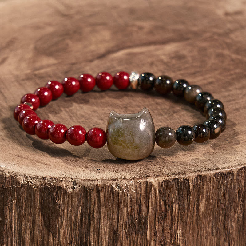 Pulsera de obsidiana negra con Buddha Stones, cinabrio y plata con brillo de gato - image 2