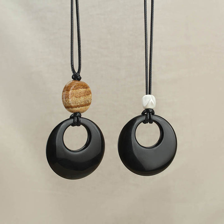 Collar con colgante de cobre con imagen de piedra de Liuli y obsidiana negra de Buddha Stones