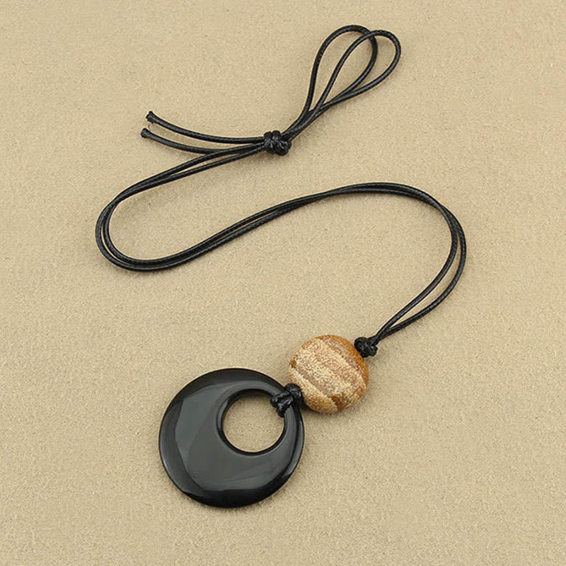 Collar con colgante de cobre con imagen de piedra de Liuli y obsidiana negra de Buddha Stones