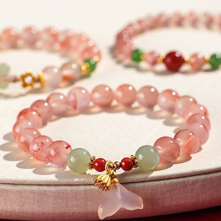 Buddha Stones, ágata roja del sur, orquídea mariposa y jade hetiano