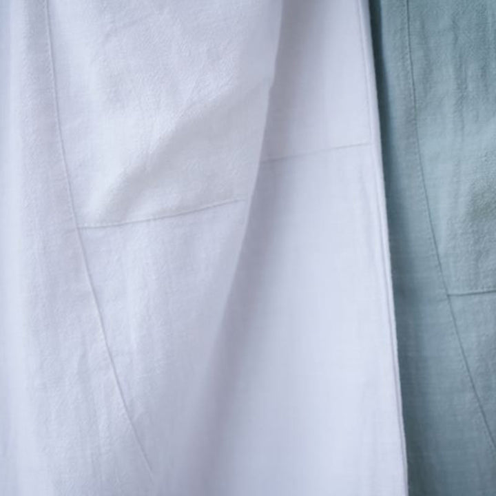 Pantalones harén de lino y algodón con ramio de color liso con cintura elástica y bolsillos para hombre de Buddha Stones