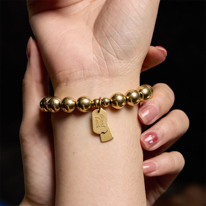 Pulsera curativa de latón y cobre con Buddha Stones - image 7