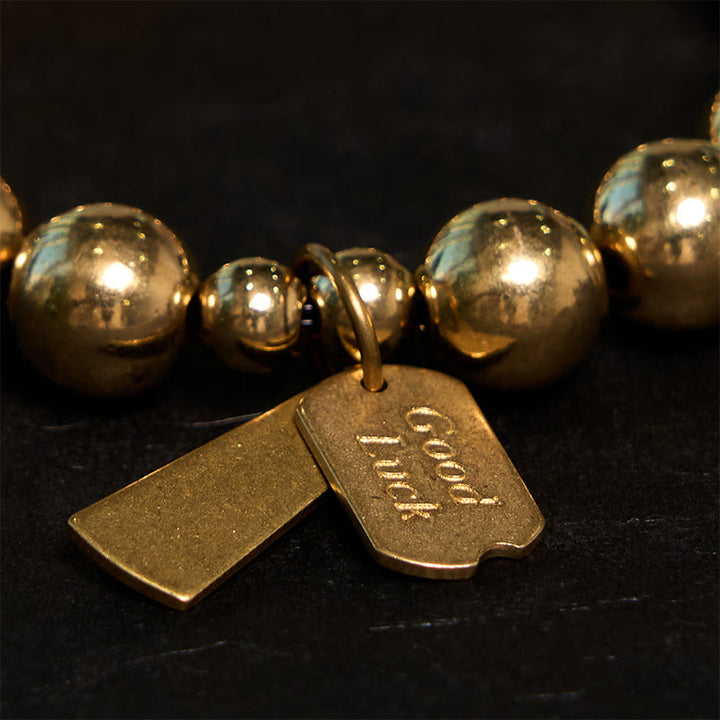 Pulsera curativa de cobre con Buddha Stones