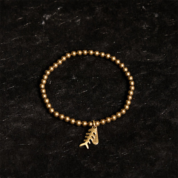 Pulsera curativa de espina de pescado de latón y cobre con Buddha Stones - image 1