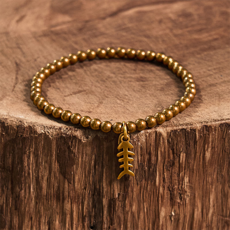 Pulsera curativa de espina de pescado de latón y cobre con Buddha Stones - image 9