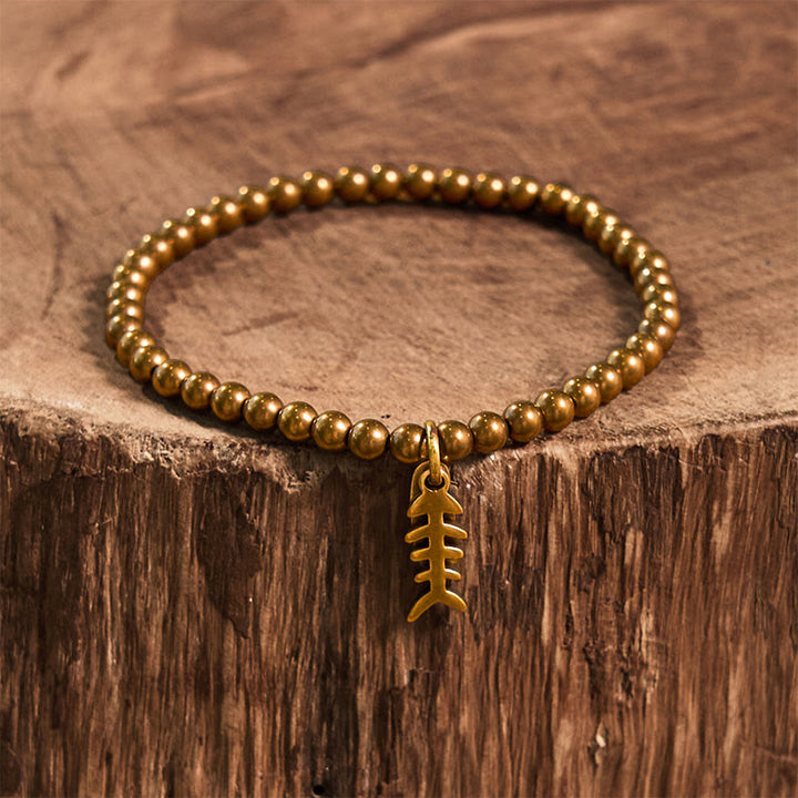 Pulsera curativa de espina de pescado de latón y cobre con Buddha Stones - image 9