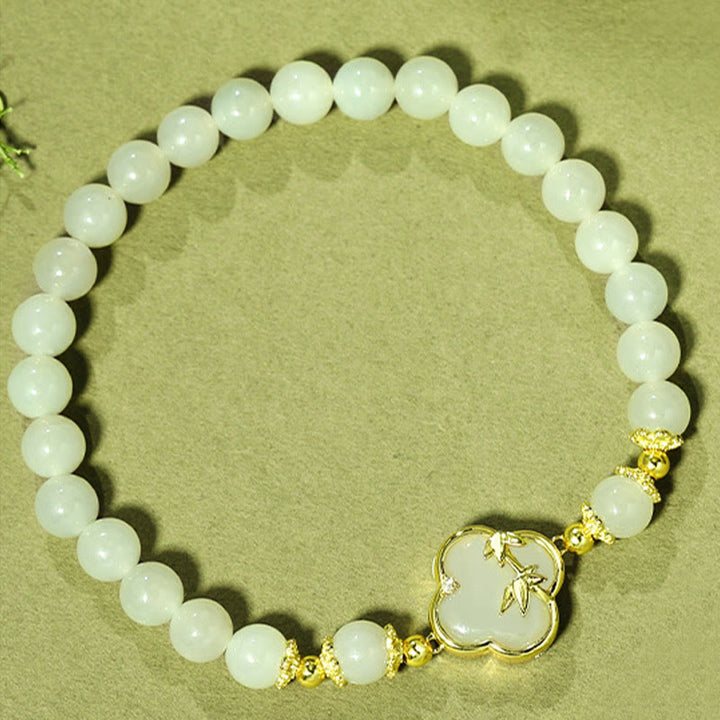 Pulsera de la suerte de bambú con trébol de cuatro hojas y jade hetiano de Buddha Stones en plata de ley 925