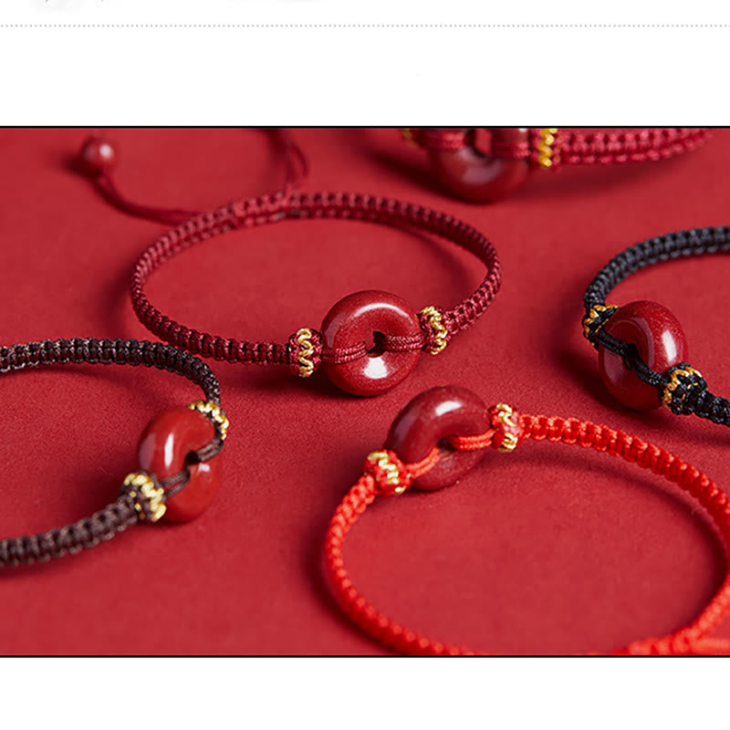 Pulsera trenzada de concentración con hebilla de paz redonda de cinabrio hecha a mano con Buddha Stones