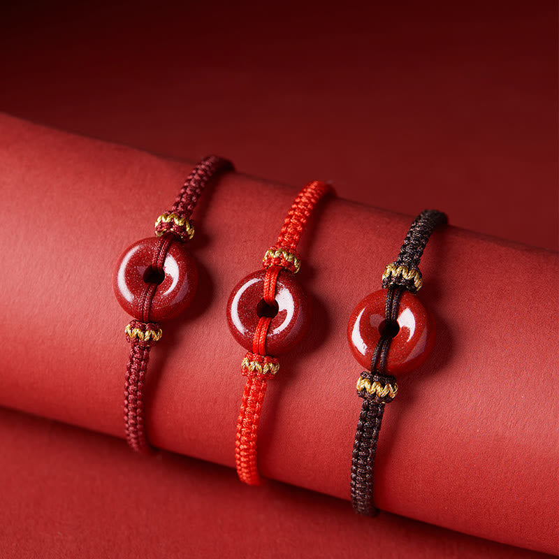Pulsera trenzada de concentración con hebilla de paz redonda de cinabrio hecha a mano con Buddha Stones