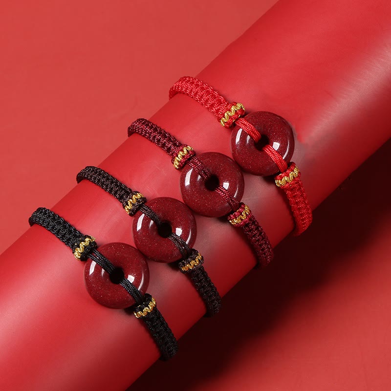 Pulsera trenzada de concentración con hebilla de paz redonda de cinabrio hecha a mano con Buddha Stones