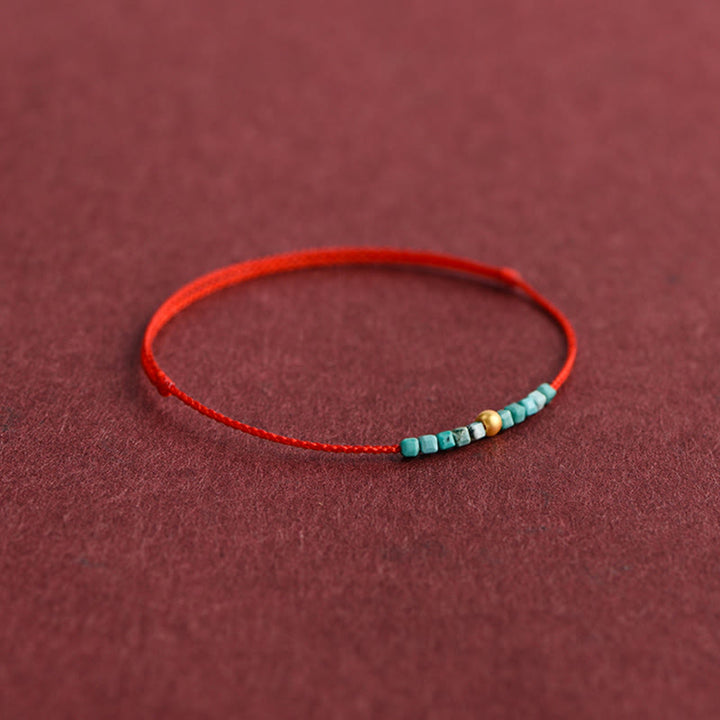 Pulsera trenzada con protección turquesa y cuentas de oro 999 de Buddha Stones - image 8