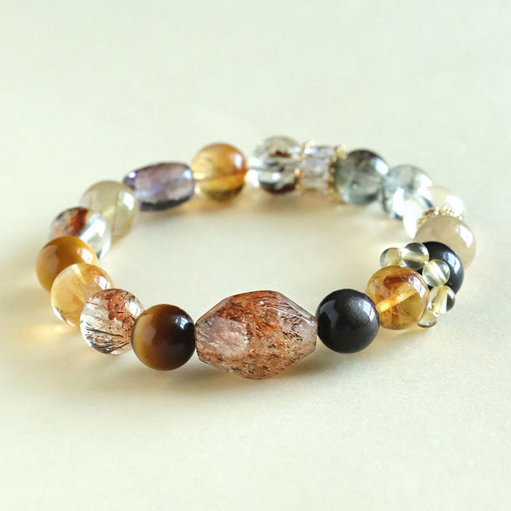 Pulsera de positividad con topacio de cristal, obsidiana, ojo de tigre y Buddha Stones Super Seven