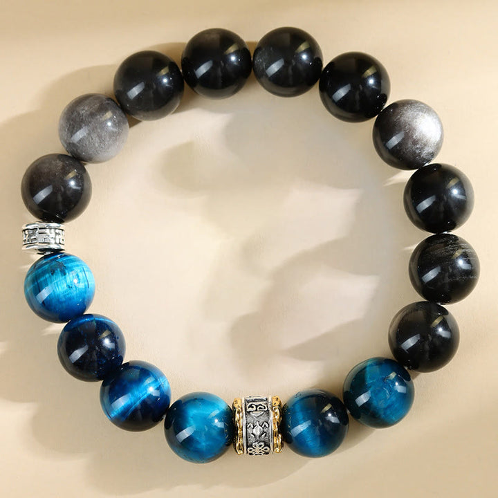 Pulsera de fuerza con obsidiana plateada y ojo de tigre azul y Buddha Stones