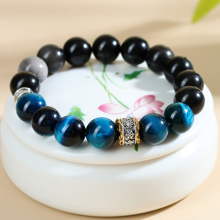 Pulsera de fuerza con obsidiana plateada y ojo de tigre azul y Buddha Stones