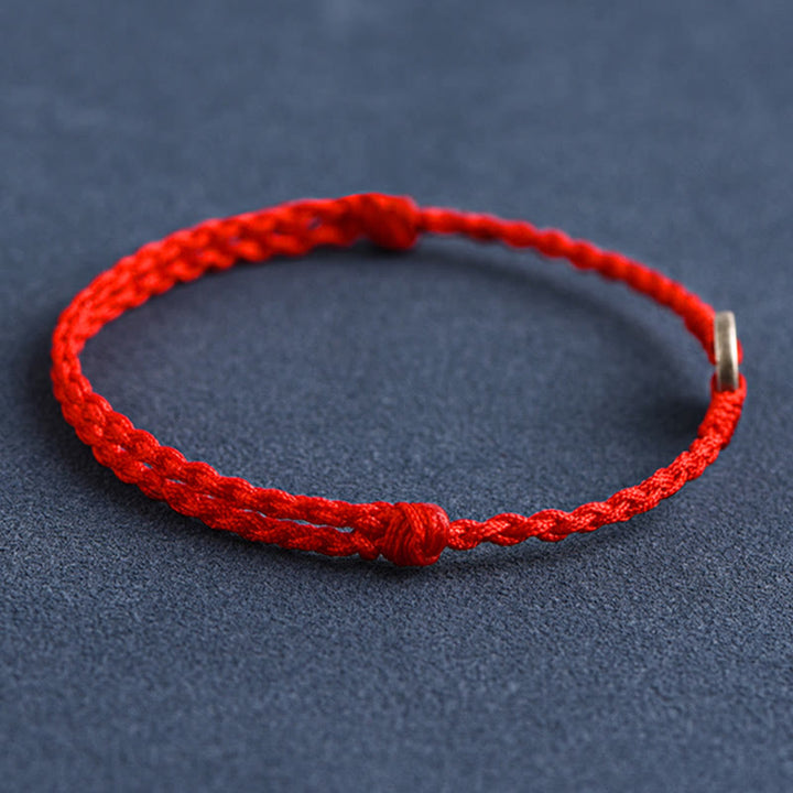 Pulsera trenzada de plata de Buddha Stones , hilo rojo, protección de la suerte