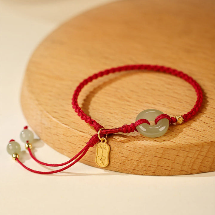 Pulsera trenzada de la suerte con hilo rojo y hebilla de paz de jade hetiano natural y Buddha Stones