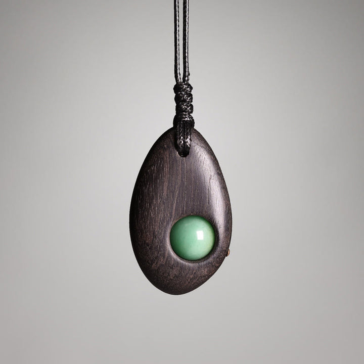 Buddha Stones Collar con colgante de paz y calma con aventurina verde y madera de ébano