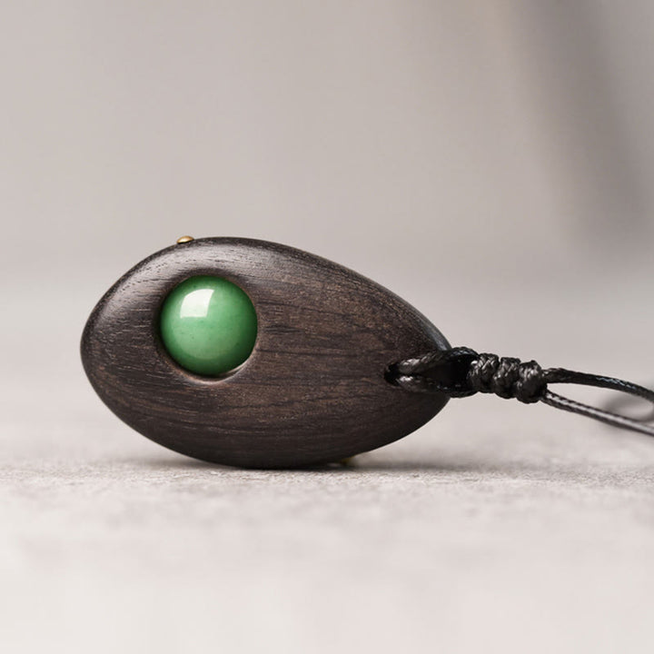 Buddha Stones Collar con colgante de paz y calma con aventurina verde y madera de ébano