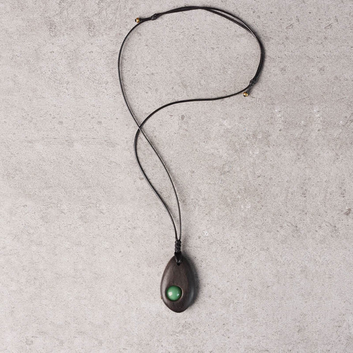 Buddha Stones Collar con colgante de paz y calma con aventurina verde y madera de ébano