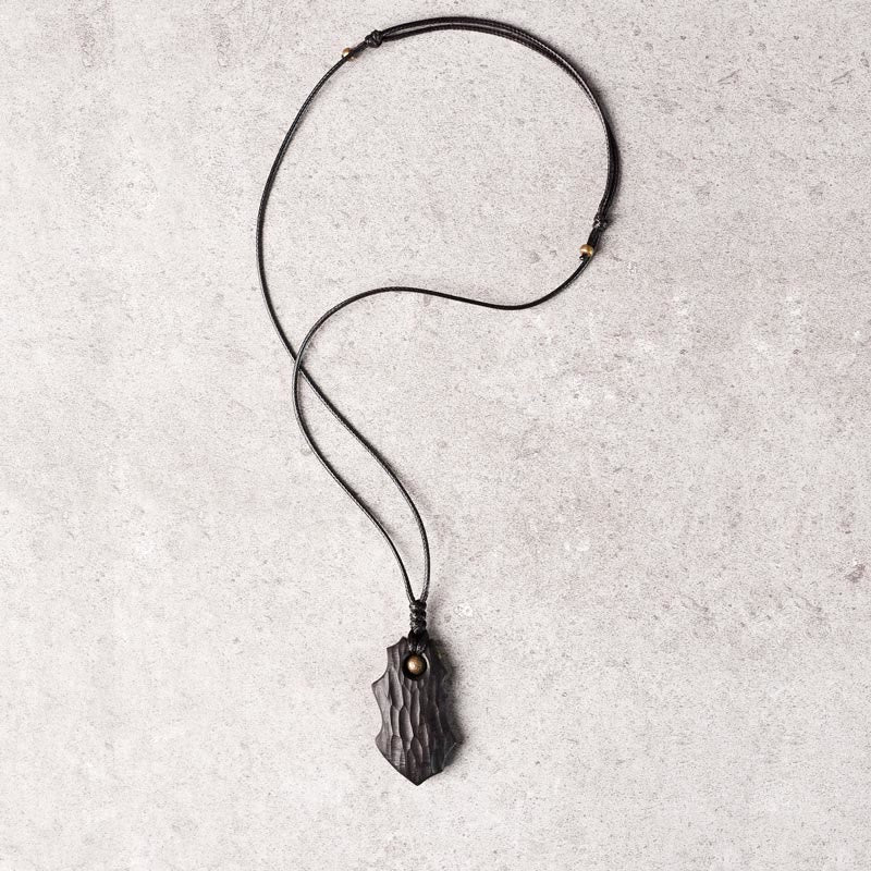 Collar con colgante de paz y calma con cuentas de cobre de forma irregular de madera de ébano y Buddha Stones