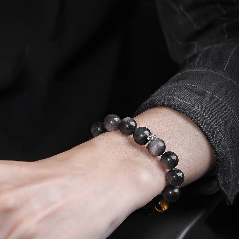 Pulsera de fuerza con seis palabras verdaderas 'Om Mani Padme Hum', obsidiana, ojo de tigre y Buddha Stones
