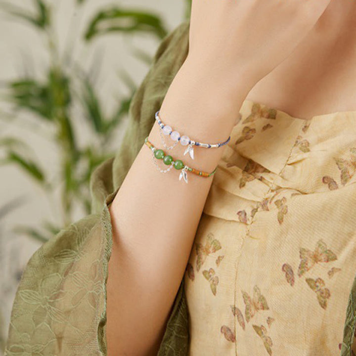 Pulsera trenzada con bendición de cuentas de calcedonia, jade hetiano, hojas de bambú y plata de ley 925 con Buddha Stones
