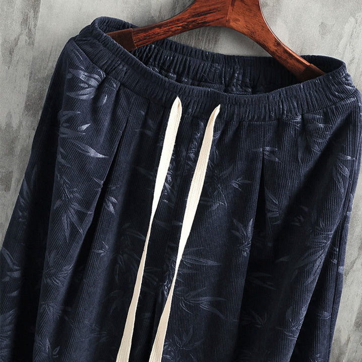 Pantalones anchos de pana con cordón de algodón y hojas de bambú y Buddha Stones para hombre con bolsillos