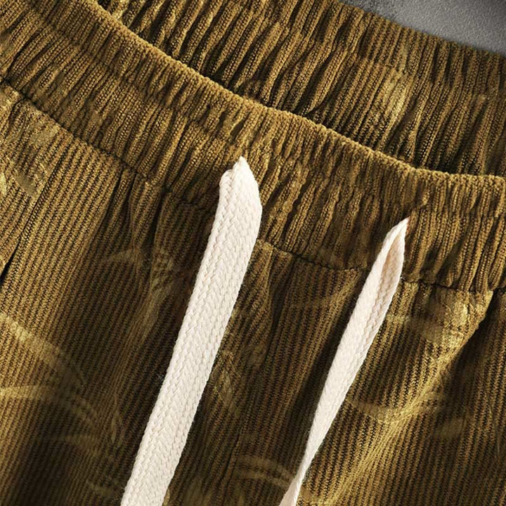 Pantalones anchos de pana con cordón de algodón y hojas de bambú y Buddha Stones para hombre con bolsillos